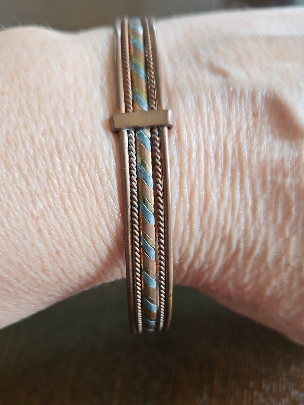 Copper Tone Tri-Accent Bangle Bracelet - Dark Gray and Gold Accents